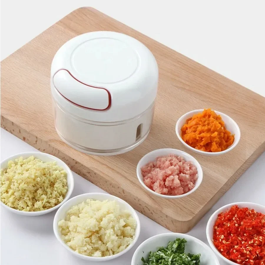 Plastic Garlic Crusher Press V - Kitchen Gadgets Pakistan บทวิจารณ์และราคา